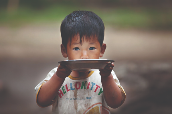Asian Child with Plate